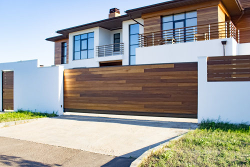 Automatic,Sliding,Doors,With,Wood,Texture,In,The,Cottage